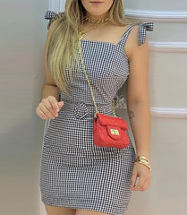 A Hip Dress With A Halter And Plaid Lace
